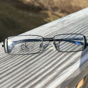CK Calvin Klein metal frame. New w demo lenses